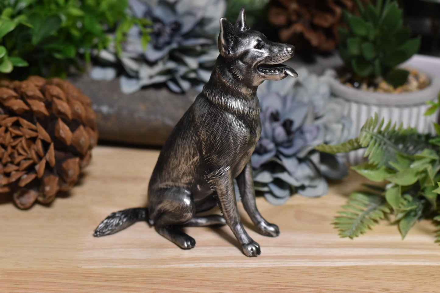 Right side of a black and silver German Shepherd sitting statue, ideal for dog lovers and collectors.