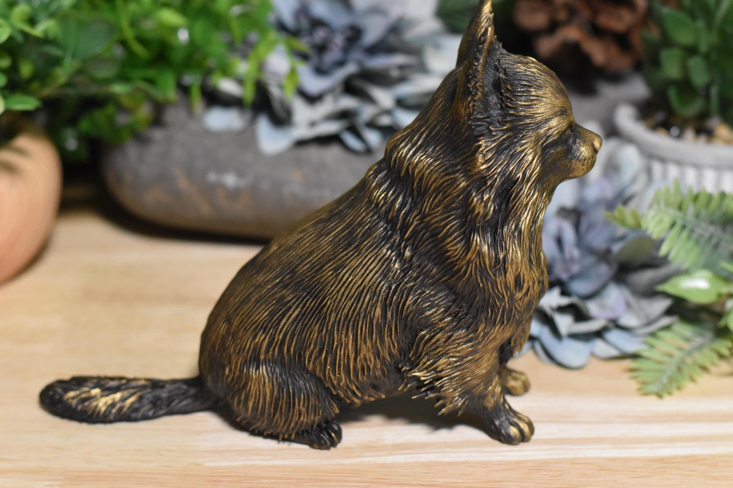 Right side of a black and gold Long Hair Chihuahua sitting figurine, perfect for dog lovers and collectors.