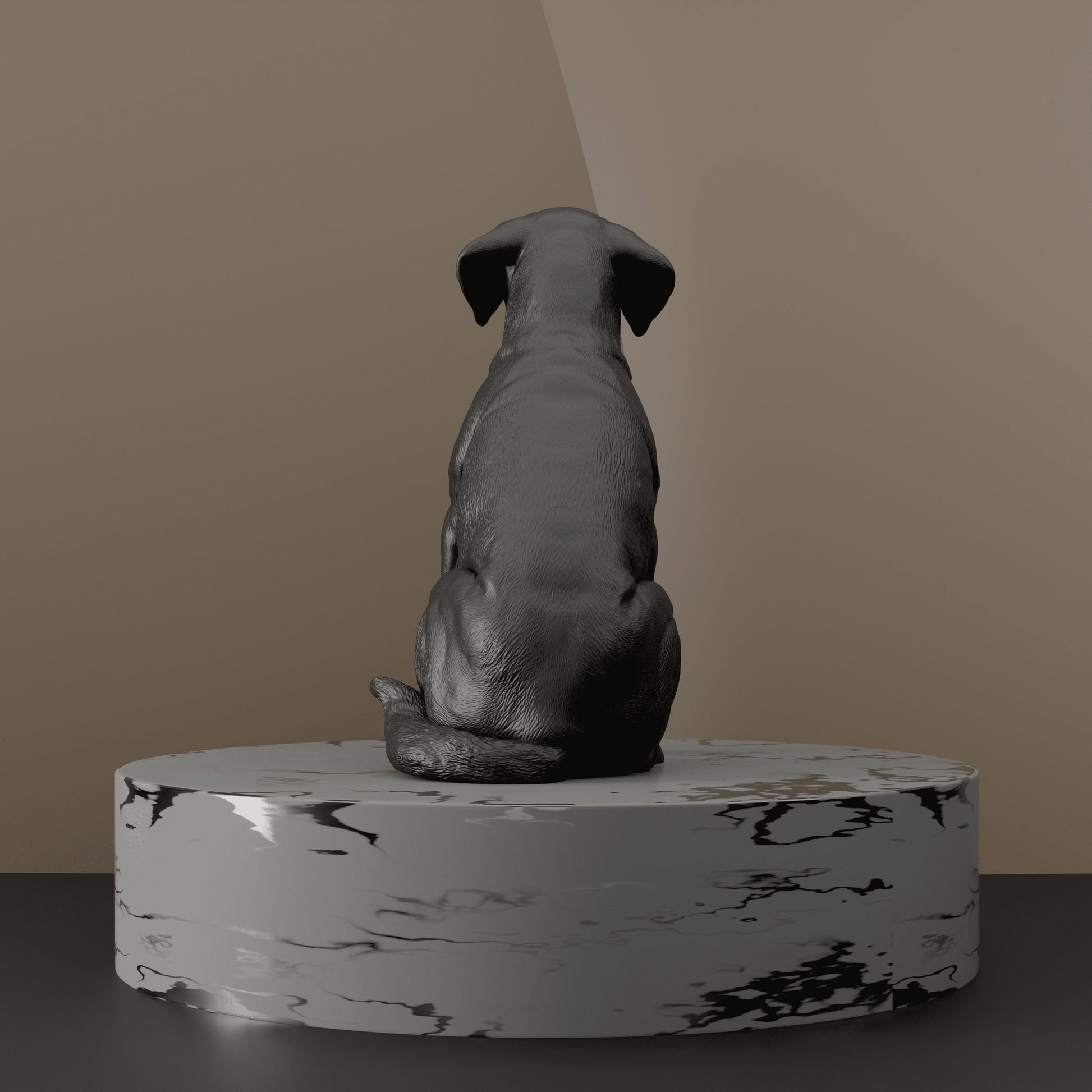 Back view of a black Labrador sitting statue, displaying intricate sculpting details.